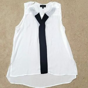 White and black sleeveless blouse